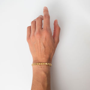 Hand modeling vintage 14k gold crosshatch or pound sign motif bracelet