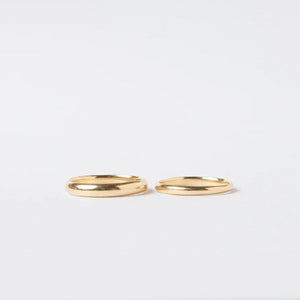 Custom 18kt gold half round ring bands by Truss and Ore