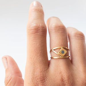 Hand modeling handmade, geometric 18k gold Lietuva ring by Truss and Ore