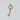 Gold Tiffany and Company key pendant