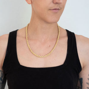 Woman modeling vintage 14k gold bold gold rope twisted chain