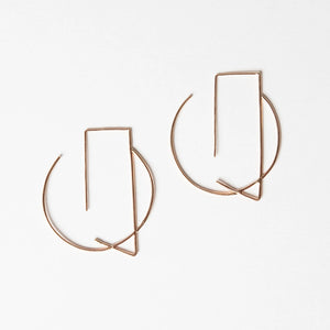 Delicate, gold hoop earrings by Truss and Ore