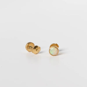 Gold opal stud earrings by Truss and Ore